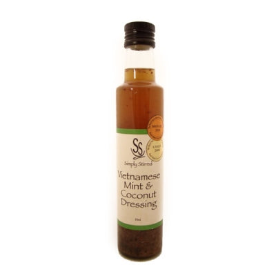 Bottle of Vietnamese Mint & Coconut Dressing with a white label on a white background